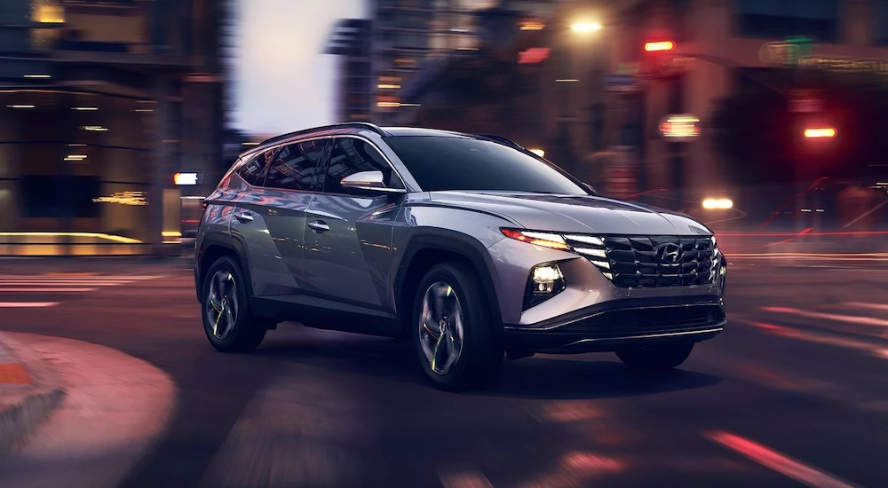 A silver 2022 Hyundai Tucson is shown from the front at an angle