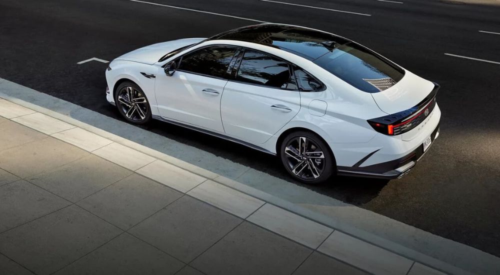 A white 2024 Hyundai Sonata N-Line is shown parked from a high angle.
