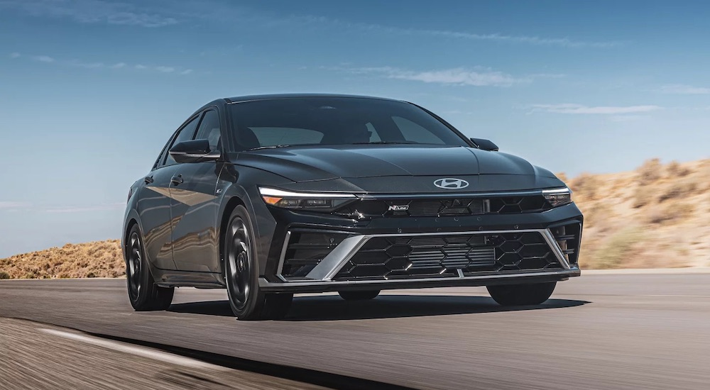 A grey 2025 Hyundai Elantra N-Line is shown from the front at an angle.